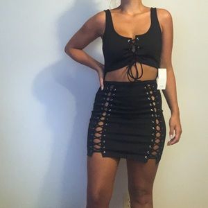 NWOT. Black lace up bodycon dress